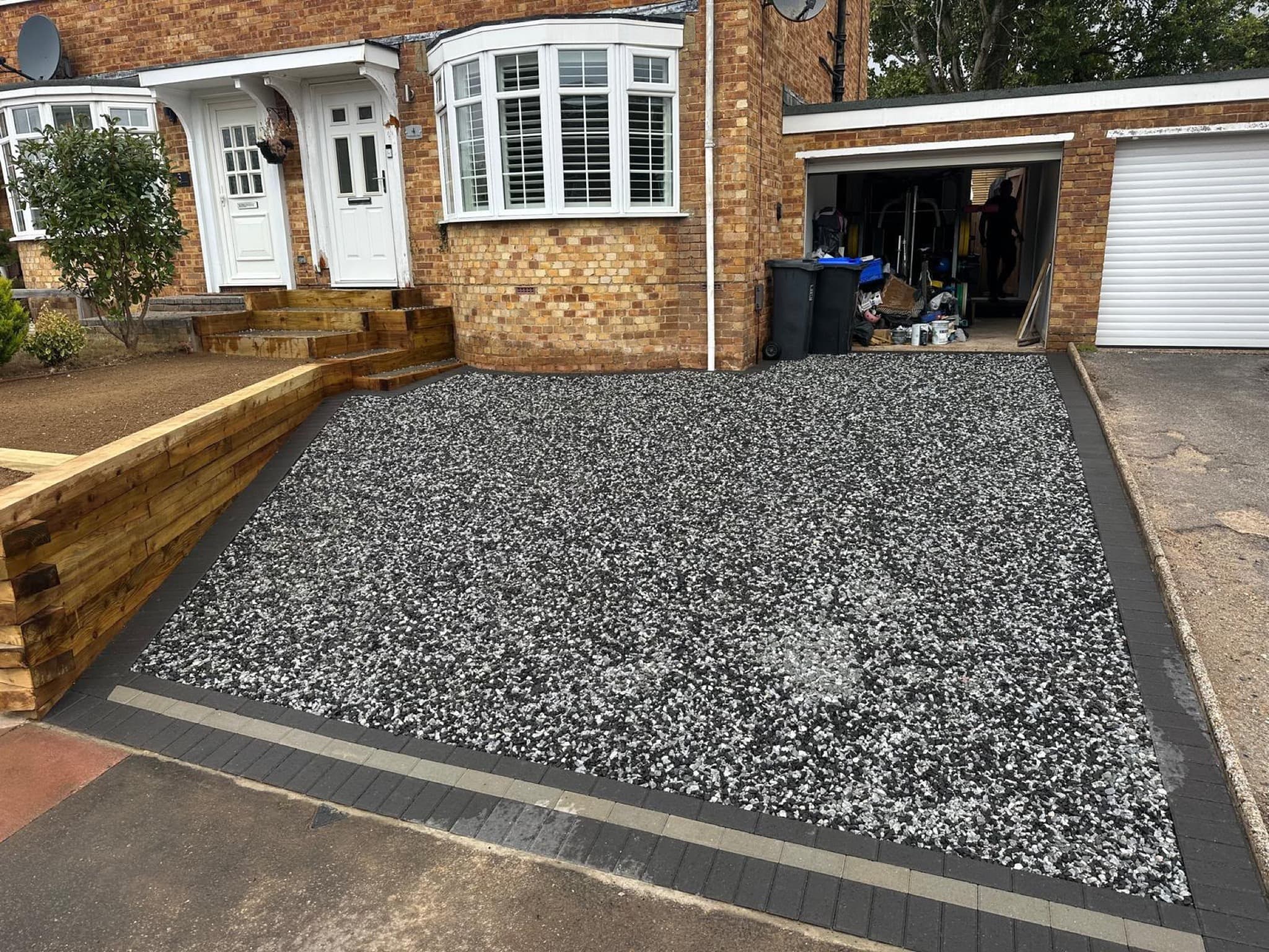 Finished granite gravel driveway with block edging